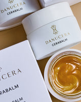 Danucera Cerabalm face balm, picture includes jar and verabalm packing